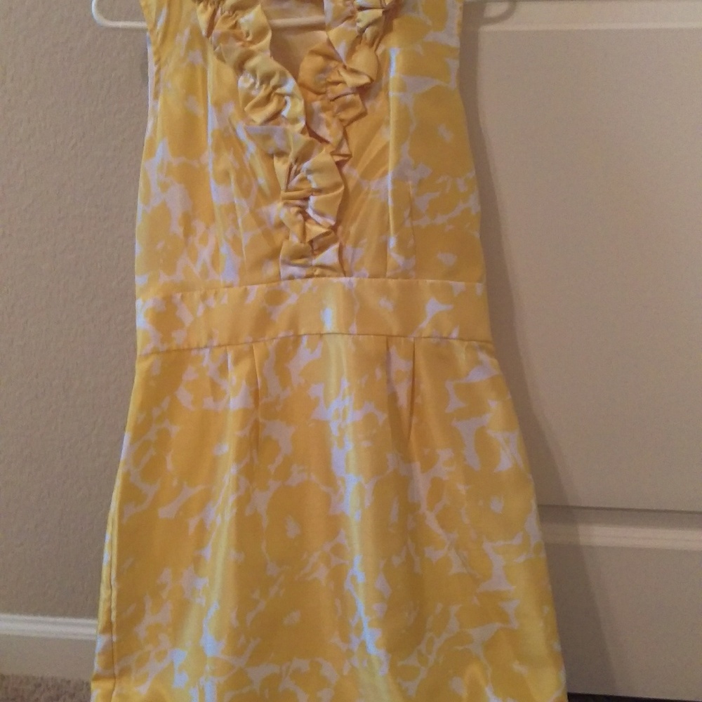 New without tags, yellow and white women's dress.